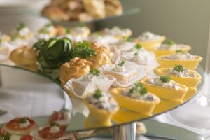 Cold snacks on buffet table. Close up.