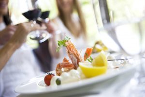 "Seafood served on plate, focus on parsley, Canon 1Ds mark III"